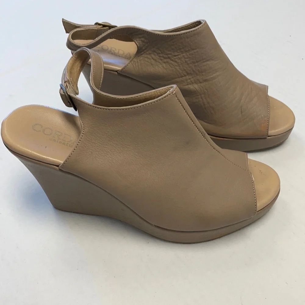 Cordani peep toe leather wedges
